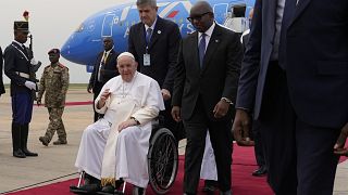 Pope Francis lands in DR Congo, welcomed with joy