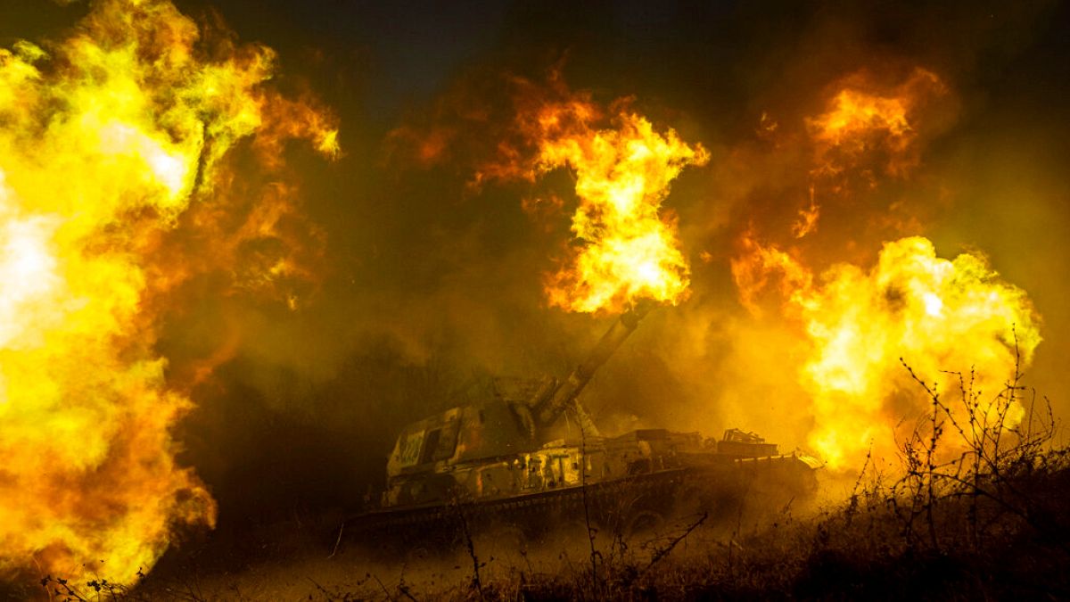 A Ukrainian self-propelled artillery shoots towards Russian forces at a frontline in Kharkiv region, Ukraine, Saturday, Dec. 24, 2022. 