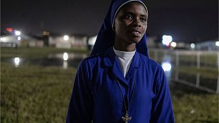 A Catholic nun waits at Ndolo airport in Kinshasa on January 31, 2023, where Pope Francis will celebrate Holy Mass on February 1