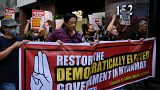 معترضان روز چهارشنبه در جریان تظاهرات همبستگی به مناسبت دومین سالگرد تسلط نظامی میانمار در مقابل سفارت میانمار در فیلیپین راهپیمایی کردند.