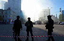 Police block a square after a drone fired on buildings in Kyiv, Ukraine, Monday, Oct. 17, 2022.