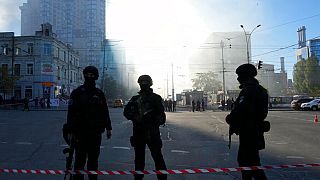 Police block a square after a drone fired on buildings in Kyiv, Ukraine, Monday, Oct. 17, 2022.