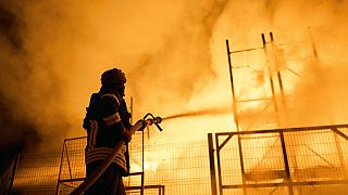 Ukrainian firefighter tries to put out fire 