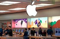 Customers shop in an Apple store in Pittsburgh, Pennsylvania, Jan. 30, 2023. 