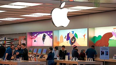 Customers shop in an Apple store in Pittsburgh, Pennsylvania, Jan. 30, 2023. 
