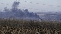 FILE - Smoke billows during fighting between Ukrainian and Russian forces in Soledar, Donetsk region, Ukraine, Wednesday, Jan. 11, 2023.