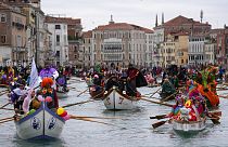 Boats sail during the water parade, part of the Venice Carnival, in Venice, Italy, Sunday, Feb. 5, 2023.