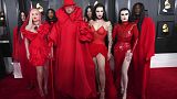 Kim Petras, left, and Sam Smith, centre, arrive with matching entourage at 65th Grammy Awards in Los Angeles