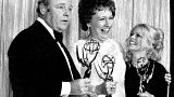 Cast members of "All in the Family," from left, Carroll O'Connor, Jean Stapleton, and Sally Struthers pose with their Emmys backstage at the 24th annual Emmy Awards