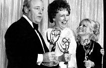 Cast members of "All in the Family," from left, Carroll O'Connor, Jean Stapleton, and Sally Struthers pose with their Emmys backstage at the 24th annual Emmy Awards