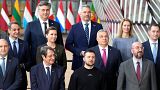 Ukraine's President Volodymyr Zelenskyy, center front, poses with European Union leaders during a group photo at an EU summit in Brussels on Feb. 9, 2023.