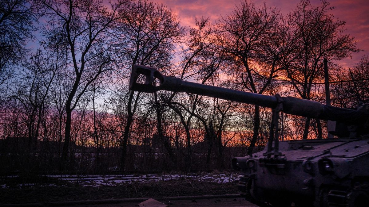 A Ukrainian self-propelled howitzer runs at sunset in the Donetsk region on February 9, 2023, amid the Russian invasion of Ukraine.