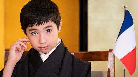 Ten-year-old kabuki actor Maholo Terajima attends a press conference at the French embassy in Tokyo on February 7, 2023. 