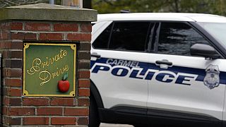 Carmel, Ind. police secure the entrance to the neighborhood of former Vice President Mike Pence's Indiana home, Friday, Feb. 10, 2023 in Carmel, Ind.