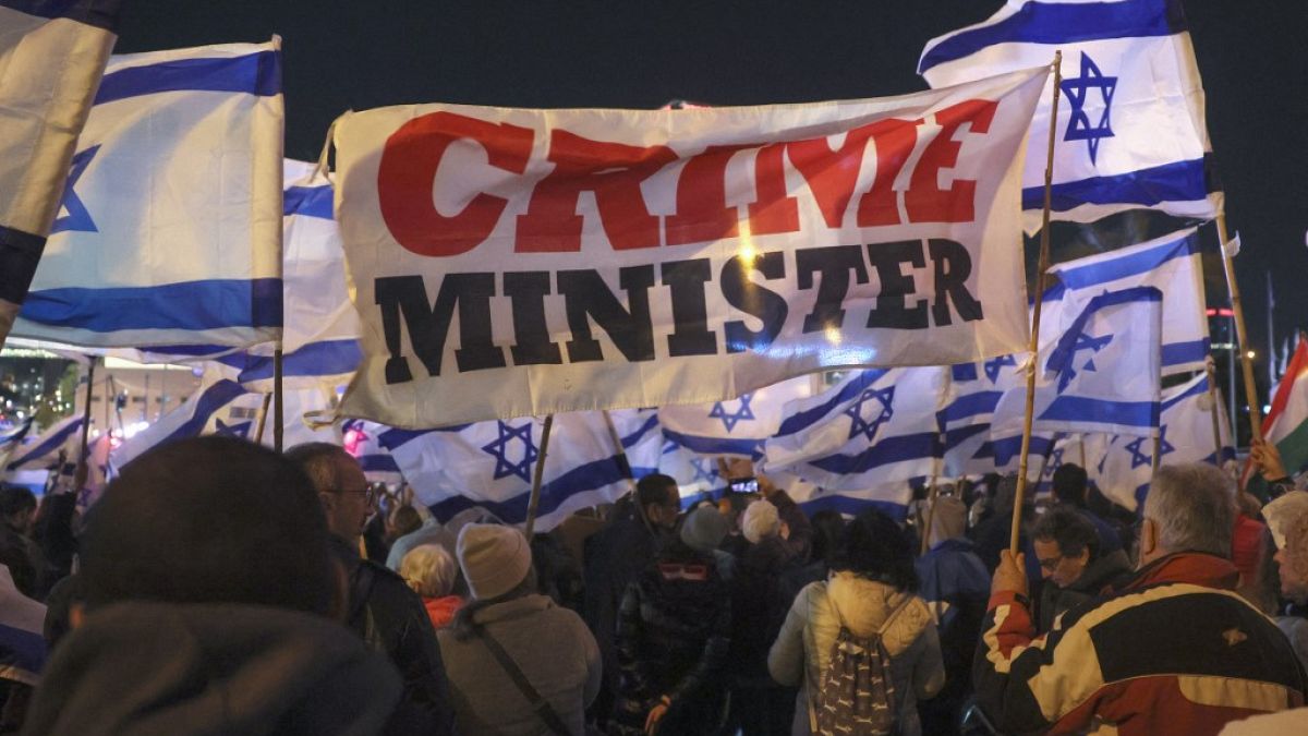 Israelis protest against plans by Prime Minister Benjamin Netanyahu's new government to overhaul the judicial system, in Tel Aviv, Israel, Feb. 4, 2023.