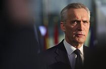 NATO Secretary General Jens Stoltenberg speaks as he arrives for a NATO defense ministers meeting at NATO headquarters in Brussels. 