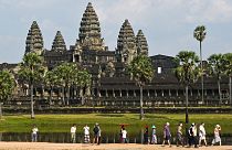 Tourists visit the Angkor Wat temple complex, a UNESCO World Heritage Site, in Siem Reap province.