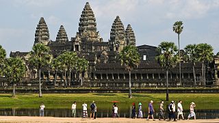 Tourists visit the Angkor Wat temple complex, a UNESCO World Heritage Site, in Siem Reap province.