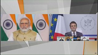 Los presidente indio y francés durante la firma del acuerdo