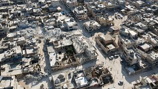 An aerial view shows collapsed buildings following last week's earthquake in Syria's rebel-held village of Atarib.