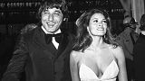 FILE - New York Jets football player Joe Namath arrives with actress Raquel Welch to the 44th annual Academy Awards ceremony in Los Angeles on April 10, 1972.
