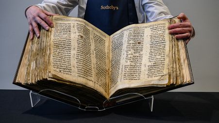 The 'Codex Sassoon' bible is displayed at Sotheby's in New York on February 15, 2023.
