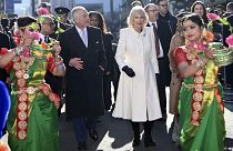 Britain's King Charles III and Camilla, the Queen Consort visit Brick Lane in east London, Wednesday Feb. 8, 2023