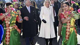 Britain's King Charles III and Camilla, the Queen Consort visit Brick Lane in east London, Wednesday Feb. 8, 2023