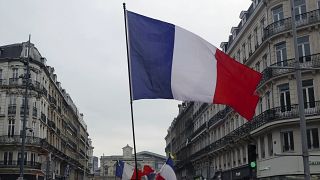 Protesters march during a demonstration against a reform aimed at raising the minimum retirement age from 62 to 64, in Lille, France, 16 February 2023