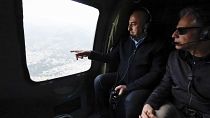 U.S. Secretary of State Antony Blinken, right, and Turkish Foreign Minister Mevlut Cavusoglu sit in a helicopter for a tour of earthquake stricken areas, in Turkey, 19 Feb '23