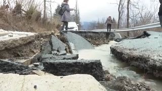 Motorists stranded by flooded roads in Romania