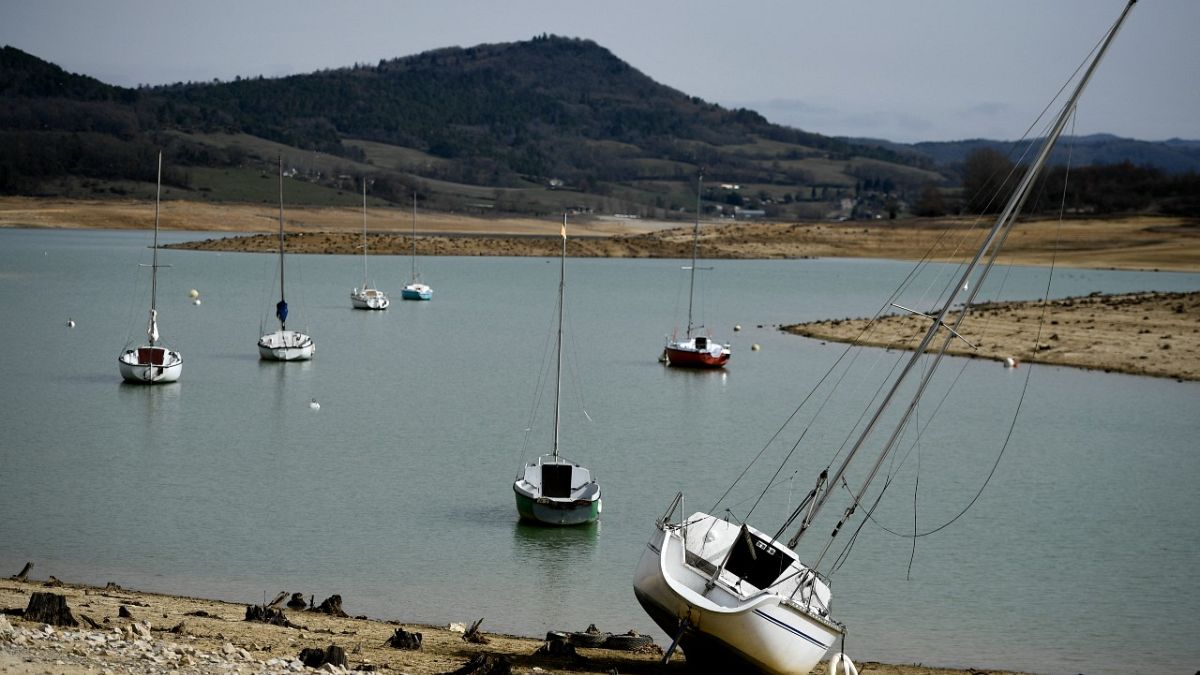  Boats on the partially dry Lake Montbel, south-western France, on February 21, 2023. France has matched its record dry spell of 31 days without significant rainfall.