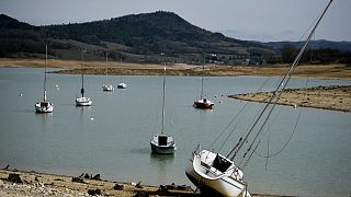  Boats on the partially dry Lake Montbel, south-western France, on February 21, 2023. France has matched its record dry spell of 31 days without significant rainfall.