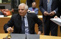 European Union foreign policy chief Josep Borrell rings a bell to signify the start of a meeting of EU foreign ministers at the European Council building in Brussels on 20 Feb
