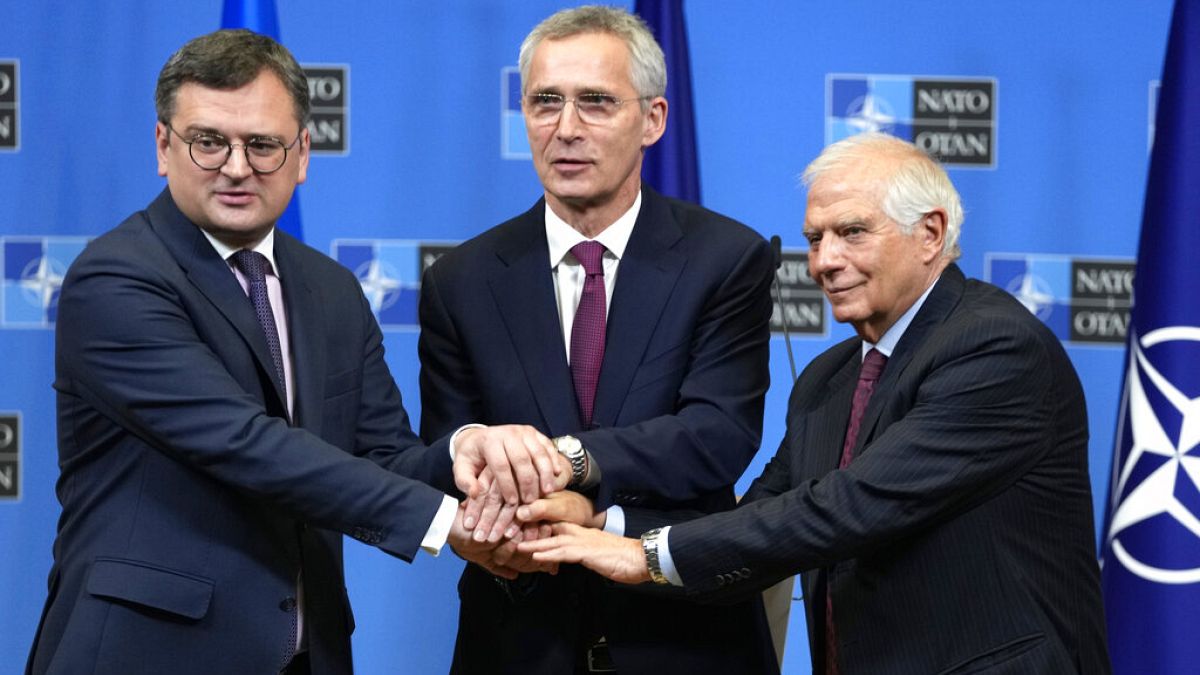 From left, Ukraine's Foreign Minister Dmytro Kuleba, NATO Secretary General Jens Stoltenberg and EU foreign policy chief Josep Borrell at NATO HQ in Brussels, Feb. 21, 2023. 