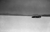 Sir Malcolm Campbell roaring across the Bonneville Salt Lake Flats, Utah, USA in his Bluebird car during his record breaking run of 301.337 miles per hour on September 3, 1935