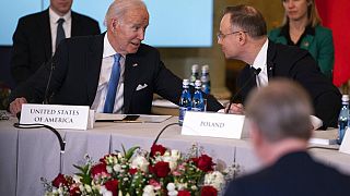 President Joe Biden talks with Polish President Andrzej Duda during a meeting with the leaders of the Bucharest Nine, Wednesday, Feb. 22, 2023, in Warsaw.