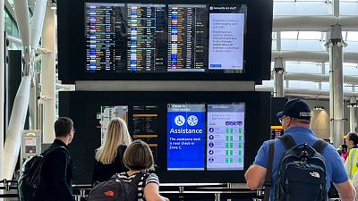 Travellers at Heathrow airport, in London.