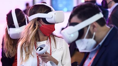 Visitors enter the metaverse at MWC 2022