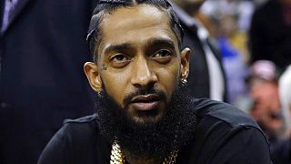 Rapper Nipsey Hussle attends NBA basketball match between Golden State Warriors and Milwaukee Bucks in Oakland, Calif., March 29,  2019