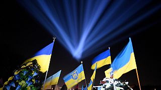 A symbolic "ray of memory" illumination at the graves of Ukrainian soldiers who died in the Russia's war at Lychakiv Cemetery in Lviv, Ukraine, February 23, 2023.