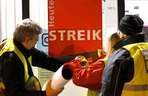 Strikers put a poster with the words 'Strike today' on a window pane in Cologne, Germany, 26 February 2023. 