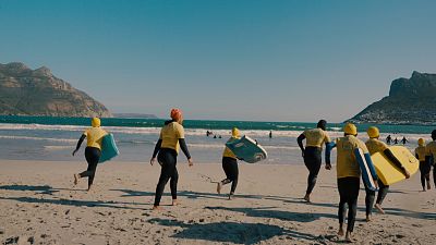 Through an afterschool programme, South African students learn to swim and surf safely