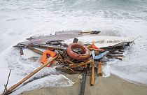 Debris from migrant's boat shipwreck, washed ashore by sea at a beach near Cutro, southern Italy,