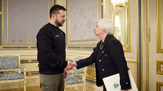 Ukrainian President Volodymyr Zelenskyy, left, and U.S. Treasury Secretary Janet Yellen shake hands during their meeting in Kyiv, Ukraine, Monday, Feb. 27, 2023.