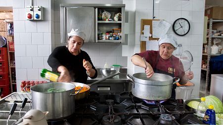 Rosa Manfra and Rosaria Fele cooking in the Chiku restaurant in Naples, Italy