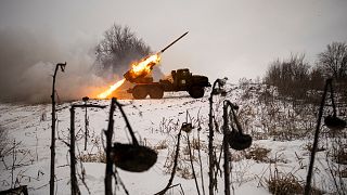 FILE - Ukrainian servicemen of the Prince Roman the Great 14th Separate Mechanized Brigade fire a Soviet era rocket launcher at Russian positions Kharkiv 23 Feb 2023