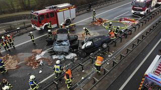 Two destroyed cars on highway 38 after a head-on collision in which three people died, in Leinefelde-Worbis, Germany, Tuesday, Dec. 20, 2022.
