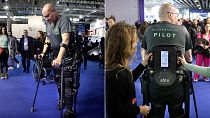An ABLE Human Motion 'pilot' demonstrates the exoskeleton at Mobile World Congress
