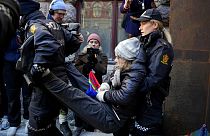 Swedish activist Greta Thunberg is carried away during a protest outside the Norwegian Ministry of Finance, in Oslo, Wednesday, March 1, 2023.
